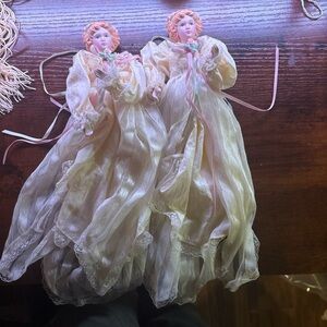 Elegant Porcelain Doll Pair with Pink Accents